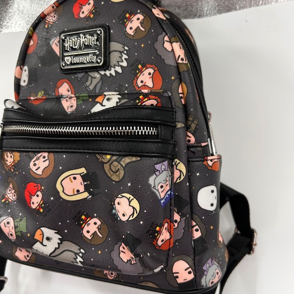 harry potter chibi character print mini backpack Bioworld Hogwarts Characters & Icons All Over White This Is An Harry Potter Product This mini backpack features a whimsical allover pattern of chibi Harry Potter Hogwarts Flap Pocket